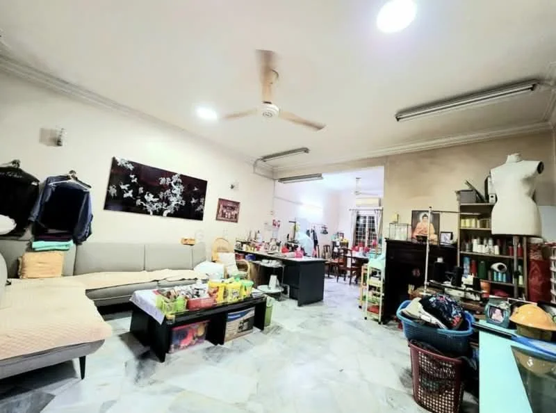 Living features: 3-seater fabric sofa in light grey, ceiling fan, marble flooring, wall-mounted artwork, multiple decorative items, various storage units, dining table in background, bright overhead lighting.