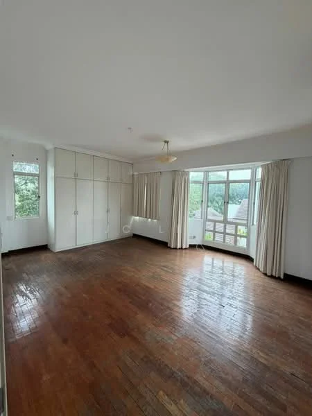 Bedroom features: wooden flooring, white painted walls, built-in wardrobe with sliding doors, floor-to-ceiling windows, curtains, ceiling light fixture, multiple windows, natural light; view: garden.