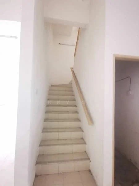 Room features: staircase with tiled steps, white painted walls, wooden handrail, natural light from upper level, no visible decor or furnishings; style: minimalist.