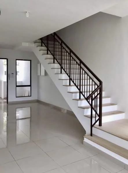 Room features: white painted walls, glossy ceramic tile flooring, metal railing on staircase, staircase with white steps, large windows, door with glass panel, neutral color scheme, open layout; style: modern.
