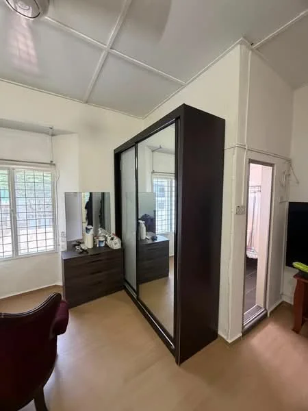 Bedroom features: wooden flooring, white painted walls, sliding mirror wardrobe, dark wood dresser with drawers, large mirror on dresser, floor-to-ceiling windows, curtains, chair, TV console, wall-mounted TV; style: modern.