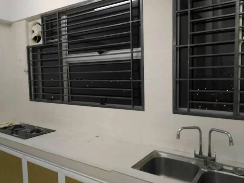 Kitchen features: double-bowl stainless-steel sink, chrome faucet, white tiled walls, light-colored countertop, gas hob with two burners, window with security bars, city view through window, under-cabinet lighting; style: modern; view: city.