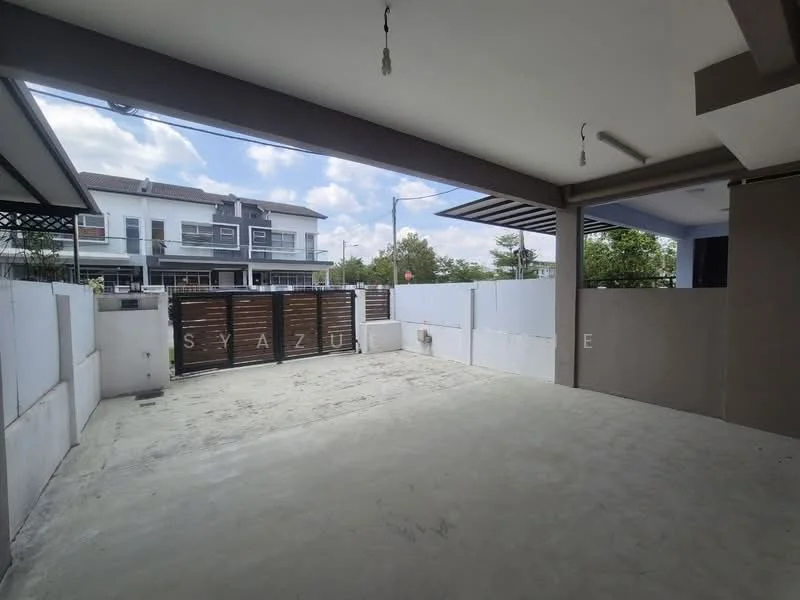 Exterior type: linked terrace house; features: concrete flooring, fenced perimeter, gate at entrance, two-storey house in background, manicured landscaping, open space, covered porch area, partially shaded area; style: modern.