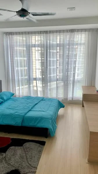 Bedroom features: queen-size bed with turquoise bedding, floor-to-ceiling windows, sheer curtains, wooden flooring, ceiling fan, wooden bedside table, area rug with abstract pattern, wall-mounted decor; style: modern.