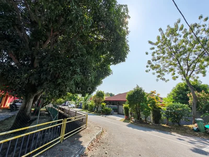 Exterior type: detached bungalow; features: manicured lawn, mature trees, paved walkway, fence, single-storey, surrounded by greenery; style: traditional.