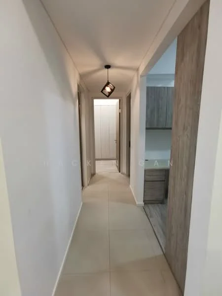 Hallway features: white painted walls, tile flooring, pendant light fixture, doorway leading to other rooms, neutral color scheme, built-in cabinetry on one side; style: modern.