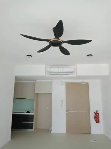 Room features: 5-blade ceiling fan with light, wall-mounted split AC, white painted walls, light-colored flooring, kitchen cabinetry with black finish, kitchen countertop with light color, door with wood finish, fire extinguisher mounted on wall; style: modern.