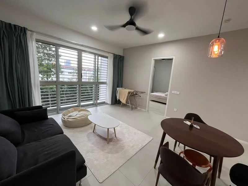 Living features: 3-seater fabric sofa in black, coffee table, area rug, 5-blade ceiling fan with light, floor-to-ceiling windows, curtains in dark green, light-colored walls, light-colored flooring; style: modern; view: garden. Dining features: round dining table, 4 wooden dining chairs, pendant lamp, open layout; style: modern. Room features: laundry rack, bed visible in background.
