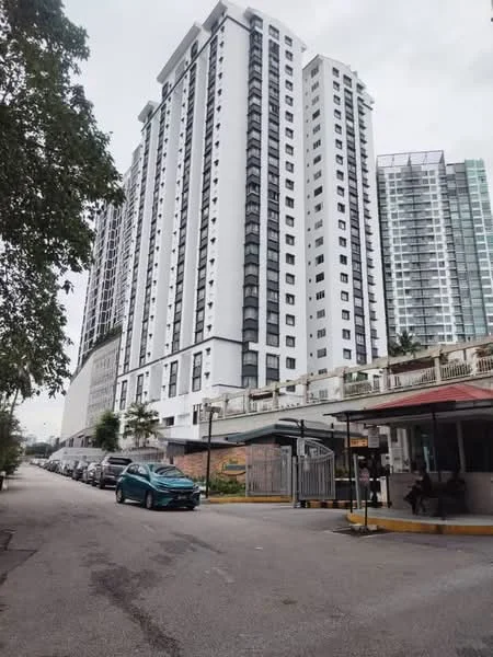 Exterior type: high-rise condominium; features: white painted facade, glass curtain wall, approximately 20-storey high-rise, surrounded by mature greenery, guard house at entrance, gated entry, driveway with interlocking pavers; style: modern.