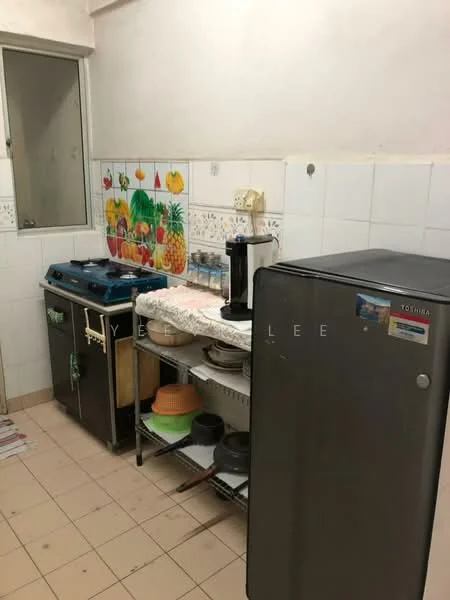 Kitchen features: white tiled walls, light beige tiled flooring, stainless-steel fridge, freestanding gas stove with oven, countertop with decorative fruit mural, open shelving with plates and bowls, kitchen utensils, window for natural light.