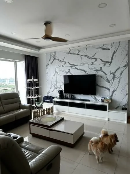 Living features: 3-seater leather sofa in light grey, recliner chair in light grey, coffee table with white top and dark wood base, TV console with white finish, wall-mounted flat-screen TV, marble accent wall with grey veining, ceiling fan with integrated light, large sliding glass door, curtains in dark grey, tile flooring in cream, decorative dog gate, houseplants in ceramic pots; style: modern; view: city.