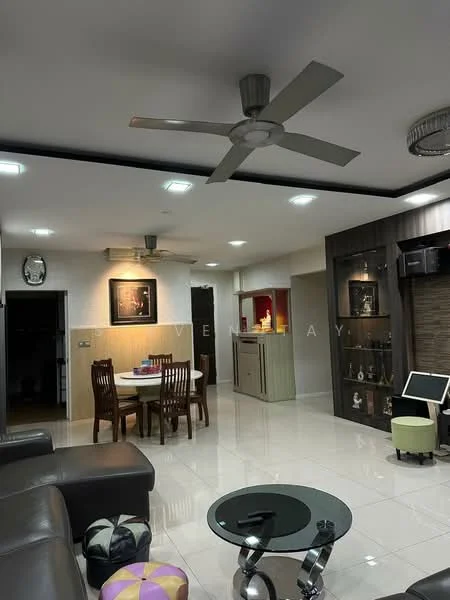 Living features: 5-blade ceiling fan with light, recessed LED downlights, polished ceramic tile flooring, dark wood feature wall, glass coffee table, 3-seater leather sofa in dark brown, dining table with 4 wooden chairs, wall-mounted TV, decorative wall art, built-in shelving unit, open layout to kitchen area; style: modern. Kitchen features: kitchen island, built-in cabinets, stainless-steel appliances, red accent wall, countertop with bar seating; style: modern.