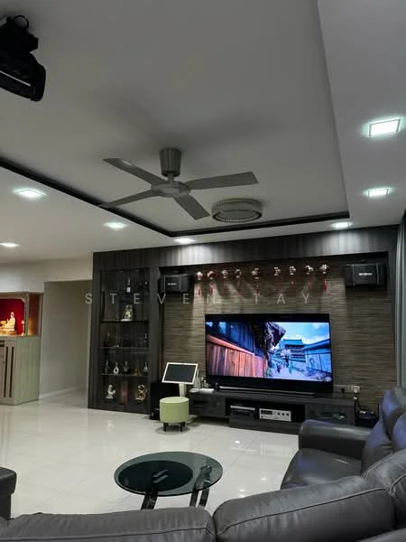 Living features: 5-blade ceiling fan with light, recessed downlights, wall-mounted TV, TV console, coffee table, leather sofa, decorative shelving unit, white tiled flooring, wood accent wall, decorative items on shelves; style: modern.