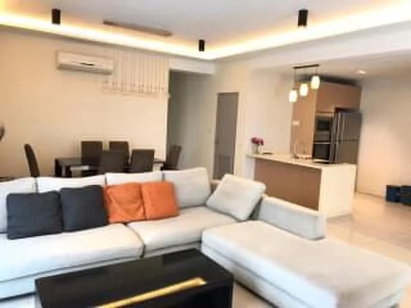 Living features: L-shape sectional sofa in light grey, orange accent cushions, black coffee table, recessed LED downlights, wall-mounted split AC, open-plan layout, white walls, tile flooring; style: modern. Dining features: 6-seater dining table, black dining chairs, pendant lighting above table, white walls, tile flooring; style: modern. Kitchen features: stainless-steel fridge, built-in kitchen cabinetry, countertop with bar seating, pendant lights, white walls, tile flooring; style: modern.