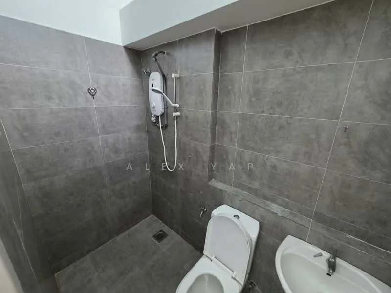 Bathroom features: grey ceramic tile walls, grey ceramic tile flooring, one-piece toilet, shower area with wall-mounted showerhead, chrome shower mixer, drain in floor, corner space for bathtub, minimalist design; style: modern.