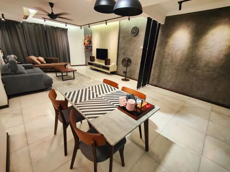 Living features: grey fabric sofa, beige L-shape sectional sofa, coffee table, wall-mounted TV, area rug, 5-blade ceiling fan with light, recessed downlights, decorative wall clock, grey curtains, artwork on wall, light-colored walls, tile flooring; style: modern. Dining features: 6-seater dining table with striped design, wooden dining chairs, decorative tray with cups, light-colored walls, tile flooring; style: modern.