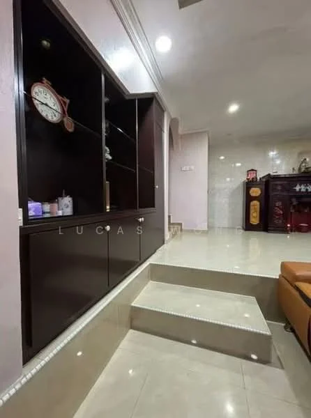 Room features: cream painted walls, glossy tile flooring, built-in cabinetry with dark wood finish, wall clock, step-up design, recessed lighting, decorative wall paneling, open space layout; style: modern.