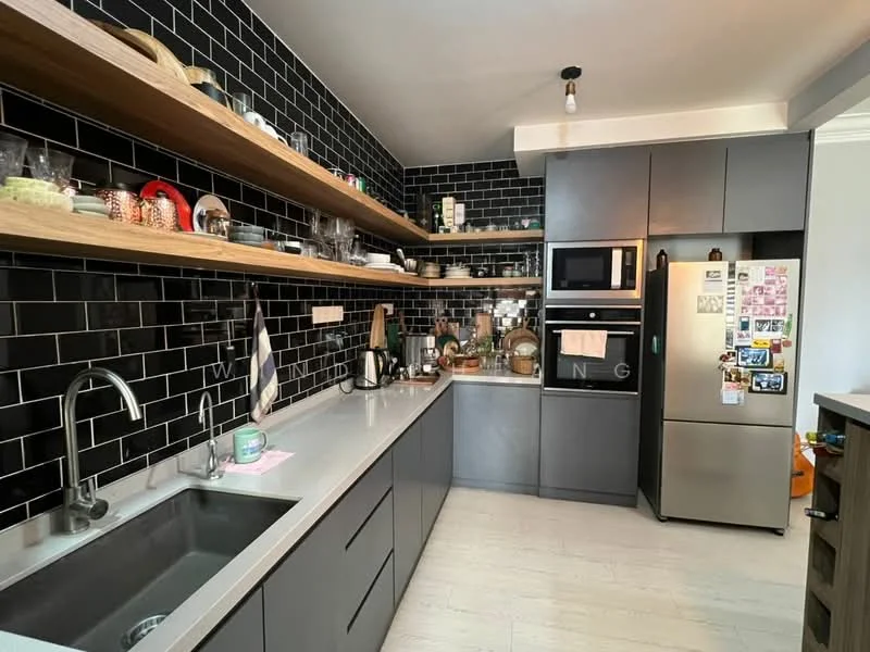 Kitchen features: black tiled backsplash, grey cabinetry, open shelving, stainless-steel fridge, built-in oven, microwave, single-bowl stainless-steel sink, chrome pull-down faucet, grey countertop, kettle, toaster, various kitchen utensils, decorative items on shelves; style: modern.