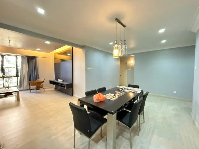 Dining features: 6-seater dining table, black upholstered dining chairs, pendant lighting above table, light wood flooring, grey painted walls, recessed ceiling lights, decorative wall panel, large window with sheer curtains; style: modern. Living features: sofa, coffee table, TV console, wall-mounted TV, large window, light wood flooring, grey painted walls, recessed ceiling lights; style: modern.