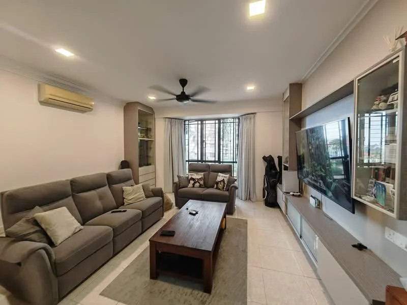 Living features: 3-seater fabric sofa in grey, 2-seater fabric sofa in grey, wood coffee table, TV console, wall-mounted TV, floor-to-ceiling windows, curtains, 1 wall-mounted split AC, ceiling fan with light, light-colored tiled flooring, decorative wall shelving, area rug with neutral color; style: modern.