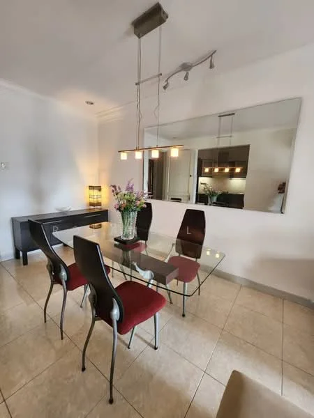 Dining features: glass dining table, 4 upholstered dining chairs in red, modern pendant lighting, large wall mirror, cream tiled flooring, white painted walls, sideboard cabinet, decorative vase with flowers, open kitchen view in background; style: modern.