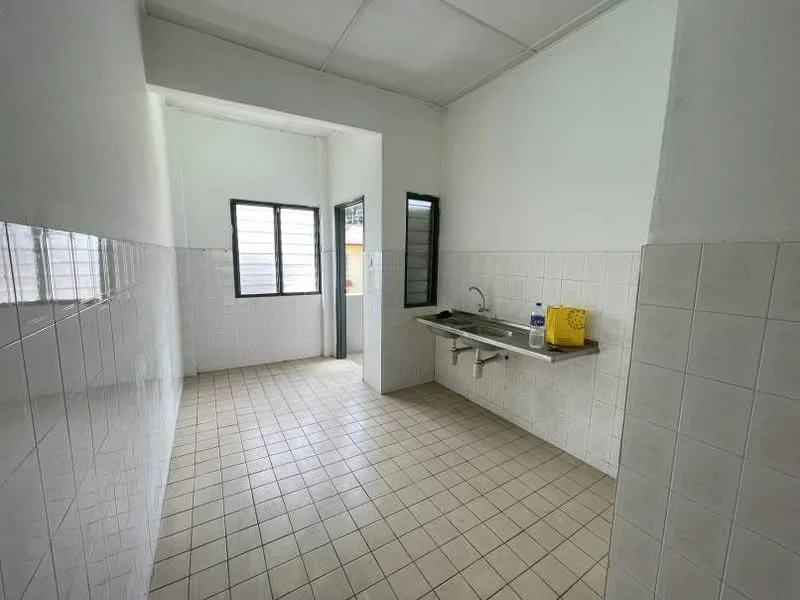 Kitchen features: white painted walls, white tiled backsplash, cream tiled flooring, single-bowl stainless-steel sink, wall-mounted faucet, window with black frames, door leading outside, counter space, yellow cleaning supplies, open layout.