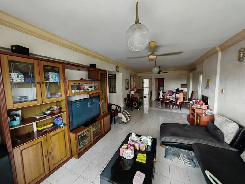 Living features: white painted walls, ceramic tile flooring, 5-blade ceiling fan with light, sofa in black leather, wooden TV cabinet, flat-screen TV, coffee table, decorative items on shelves, wall clock, area rug, dining table visible in background, open layout to adjacent room; style: contemporary.