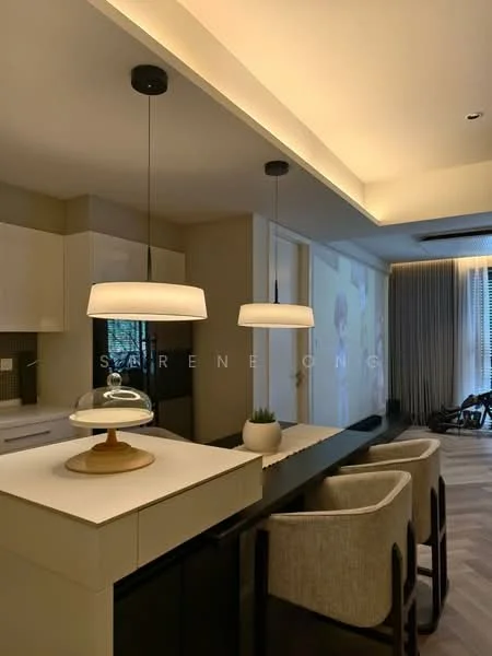 Kitchen features: white cabinetry, marble countertop, pendant lighting, recessed LED downlights, bar seating with upholstered chairs, built-in appliances, open layout, wooden flooring, decorative plant on countertop, projector screen on wall; style: modern.