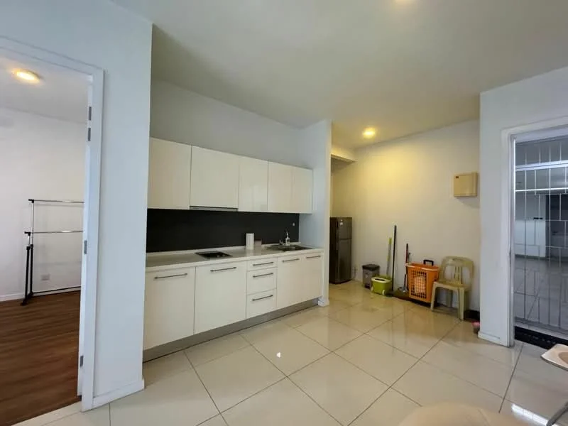Kitchen features: white flat-panel cabinets, black countertop, single-bowl stainless-steel sink, chrome pull-down faucet, built-in stove, refrigerator, ceramic tile flooring, recessed downlights, open shelving, wall-mounted storage, neutral painted walls; style: modern.
