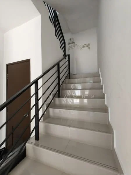 Room features: staircase with black metal railing, white painted walls, glossy beige tile flooring, natural light from upper level, door at the bottom of the stairs; style: modern.