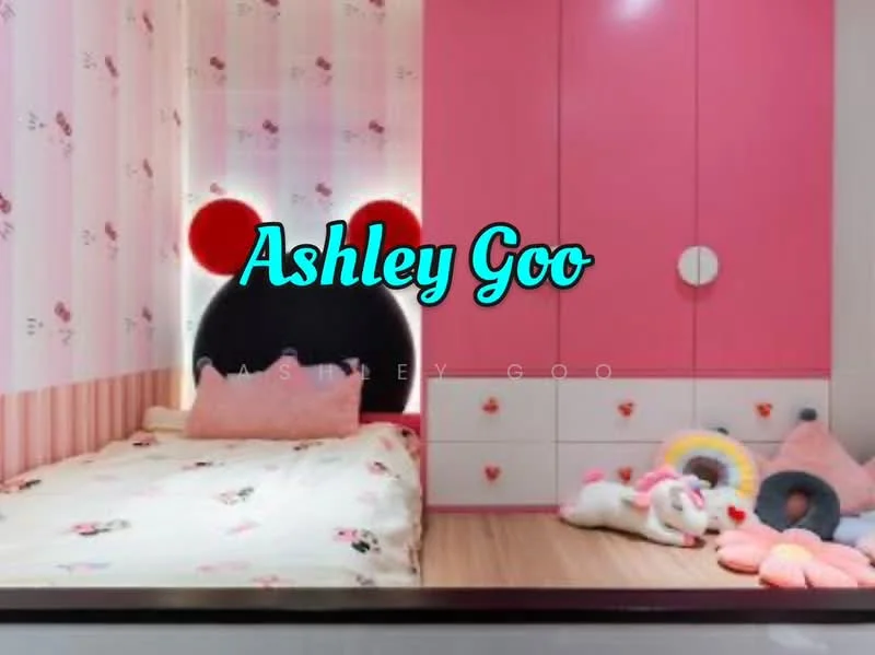 Bedroom features: pink accent wall with polka dots, wooden flooring, single bed with pink bedding, upholstered headboard with character design, built-in wardrobe with pink doors, decorative cushions in various shapes, wall-mounted curtains, soft toys on the floor; style: modern.