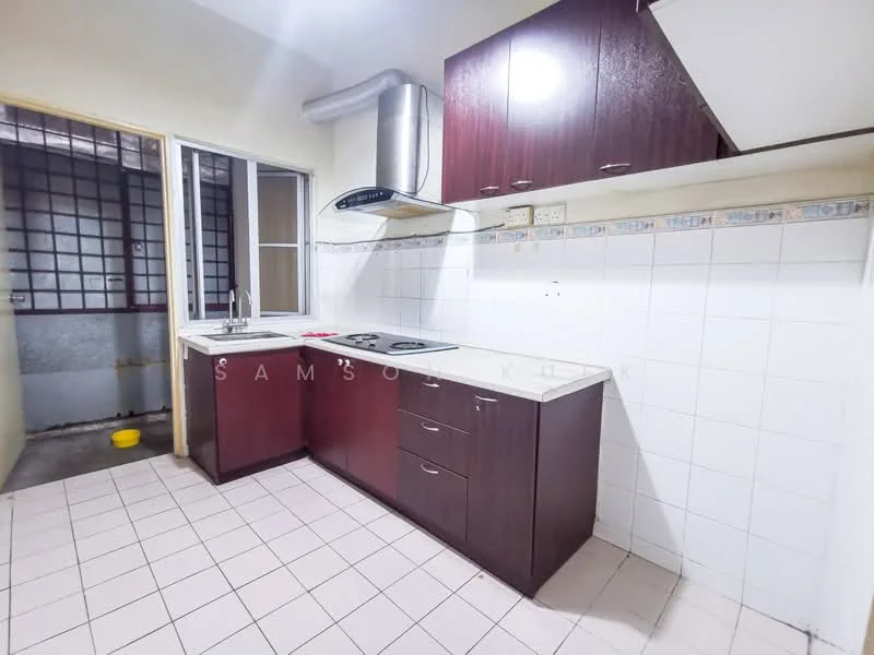 Kitchen features: brown wooden cabinetry, white tiled backsplash, stainless-steel range hood, 2-burner electric cooktop, single-bowl stainless-steel sink, countertop with storage below, window with metal grille, tile flooring, light-colored walls.