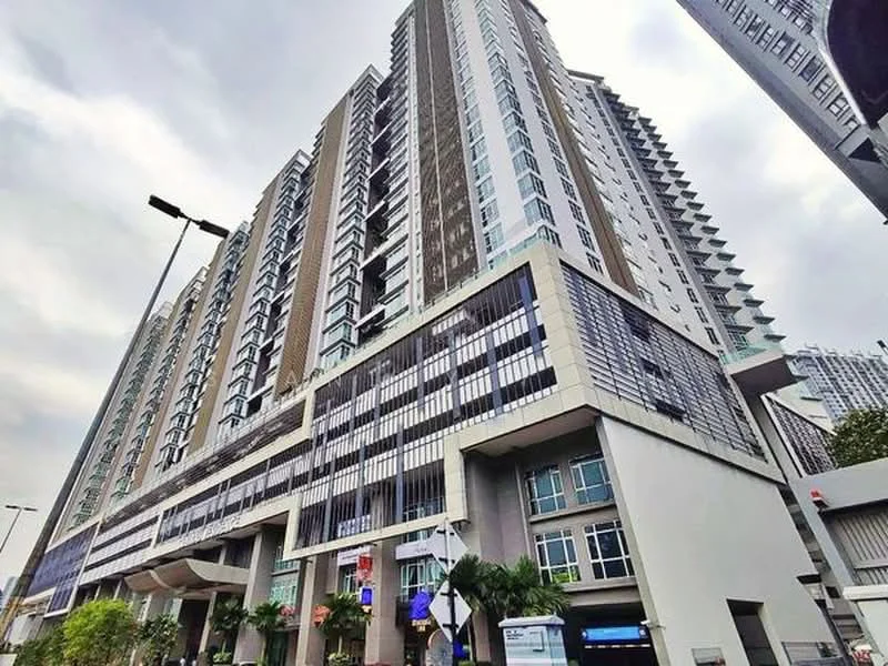Exterior type: high-rise condominium; features: glass curtain wall, exposed concrete facade, projecting balconies, vertical fins, manicured landscaping, multiple storeys, entrance with awning, street-level access; style: modern.