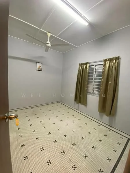 Room features: grey painted walls, white ceiling, 5-blade ceiling fan, window with horizontal slats, curtains in gold, black and white tiled flooring, framed artwork on wall, light fixture on ceiling.