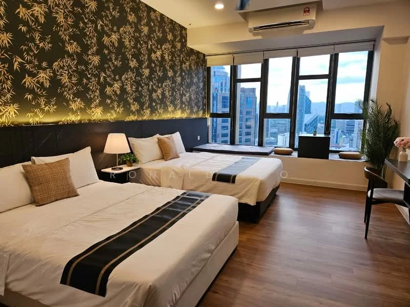 Bedroom features: two queen-size beds with white bedding, decorative throw pillows, dark wood flooring, feature wall with bamboo pattern wallpaper, floor-to-ceiling windows with city view, desk with chair, table lamp, air conditioning unit, curtains, wall-mounted TV; style: modern; view: city.