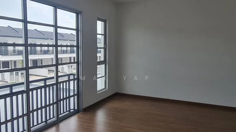 Room features: large windows with metal frames, wooden flooring, plain white walls, balcony access, natural light from windows, view of neighboring buildings, no visible furniture or decor; style: modern; view: courtyard.