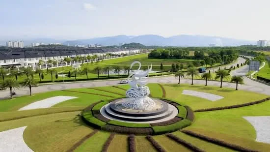 Exterior features: landscaped garden with circular design, manicured lawn, palm trees, decorative sculpture in center, paved pathways, surrounding greenery, residential buildings in background, open road, mountain view in distance; style: modern.