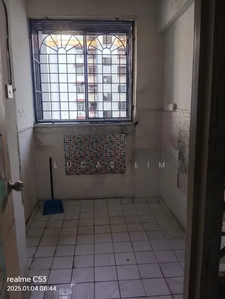 Room features: white painted walls, tiled flooring, window with decorative grille, mosaic tile feature wall, clean and uncluttered space, corner broom, natural light from window.