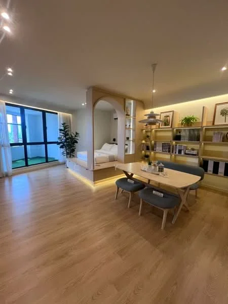 Living features: light wood flooring, recessed downlights, arched partition, built-in shelving unit, dining table with 6 chairs, greenery in pot, floor-to-ceiling windows, sheer curtains, neutral wall color, decorative wall art; style: modern; view: garden. Bedroom features: queen-size bed, white bedding, nightstand, decorative pillows, wall-mounted artwork, plant in pot; style: modern.
