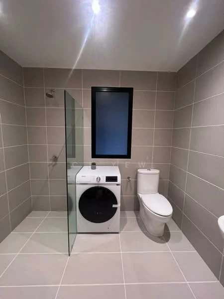 Bathroom features: grey tiled walls, white tiled flooring, glass shower enclosure, black-framed window, white one-piece toilet, front-load washing machine, chrome shower fixture, recessed ceiling lights; style: modern.