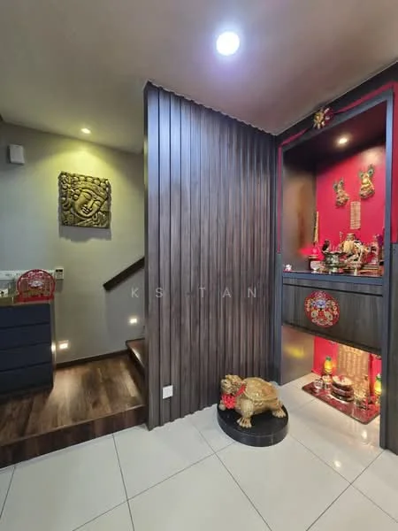 Room features: wood paneling on one wall, red accent wall, white tiled flooring, staircase leading to upper level, decorative wall art, small altar with decorative items, spotlighting on wall, decorative figurine on pedestal; style: modern.