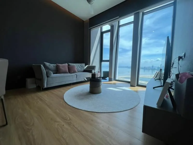 Living features: grey fabric sofa, round area rug, wooden flooring, floor-to-ceiling windows, city skyline view, wall-mounted TV, light-colored coffee table, decorative plant, recessed ceiling lights, ceiling fan; style: modern; view: city.