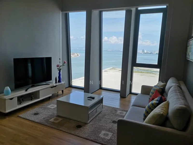 Living features: floor-to-ceiling windows, grey painted walls, wooden flooring, 3-seater fabric sofa in light grey, colorful throw pillows, coffee table, TV console, wall-mounted TV, area rug with geometric pattern, decorative vase with flowers; style: modern; view: sea.