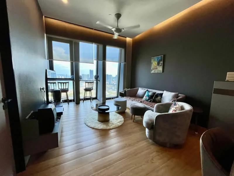 Living features: 3-seater fabric sofa in grey, 2-seater fabric armchair, round coffee table, TV console, wall-mounted TV, area rug, floor-to-ceiling windows, wooden flooring, ceiling fan, decorative artwork on wall, accent pillows, recessed LED lighting; style: modern; view: city.