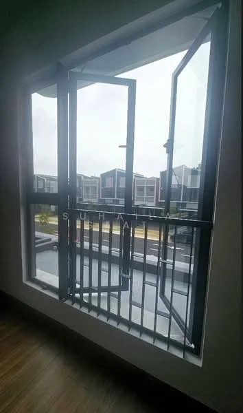 Room features: large sliding windows, metal railing, view of outdoor area, grey window frames, wooden flooring, natural light from outside; view: garden.