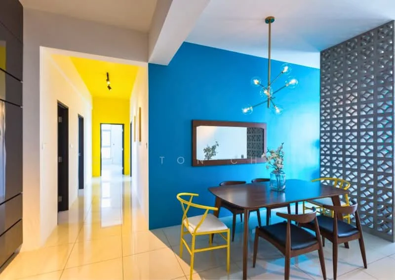 Dining features: blue accent wall, yellow accent wall, white painted walls, glossy tile flooring, wooden dining table, four wooden chairs with yellow frames, decorative mirror, chandelier with multiple bulbs, vase with flowers on table; style: modern. Hallway features: white painted walls, glossy tile flooring, two black doors, track lighting.