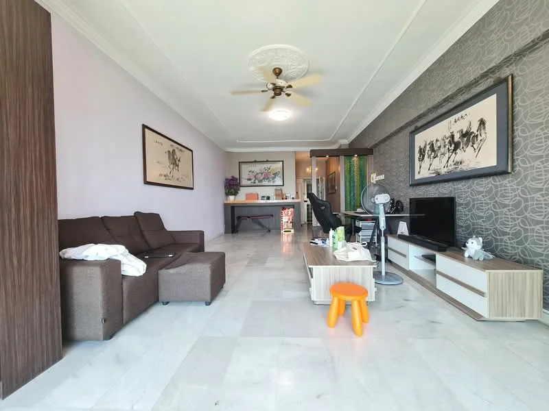 Living features: 3-seater fabric sofa in brown, coffee table with storage, TV console with drawers, wall-mounted TV, ceiling fan with light, marble flooring, decorative wall with patterned wallpaper, framed artwork on walls, open layout to kitchen, area rug, orange plastic stool; style: modern.