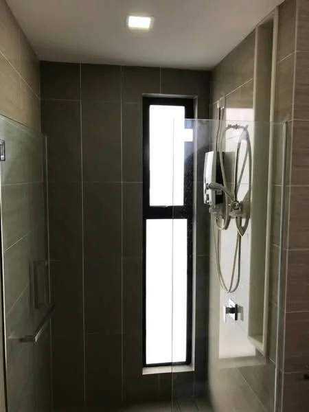 Bathroom features: walk-in shower with glass enclosure, rain shower head, handheld shower, wall-mounted shower control, grey ceramic tile walls, light grey tile flooring, window for natural light, recessed ceiling lights; style: modern.