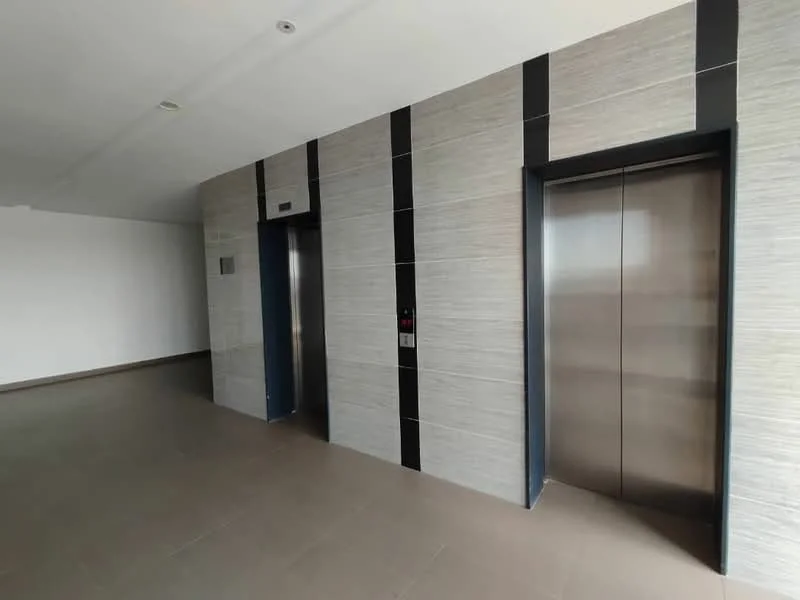 Room features: two elevator doors, grey tiled wall with vertical black accents, light grey floor tiles, elevator control panel, plain white ceiling, no visible windows, minimalist design; style: modern.