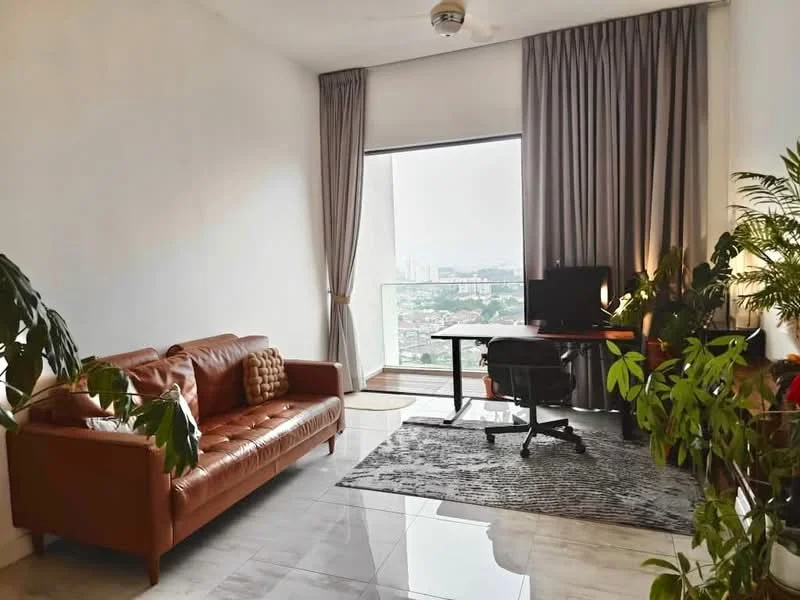 Living features: brown leather sofa, area rug with geometric pattern, floor-to-ceiling windows, curtains, desk with chair, computer monitor, indoor plants, marble tile flooring, ceiling fan; style: modern; view: city.